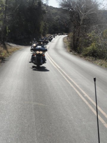 bikes35ridersridingoneupdownriverroadasighttobehold.jpg